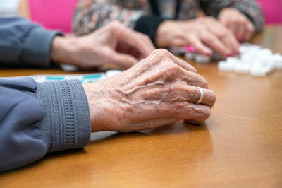 Midsection of man holding hands