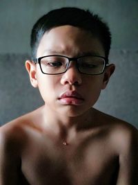 Portrait of young man wearing eyeglasses