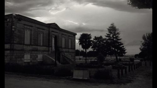 Built structure against cloudy sky