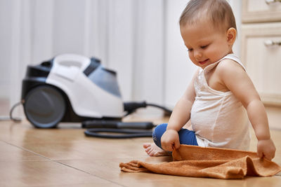 Boy playing with toy car