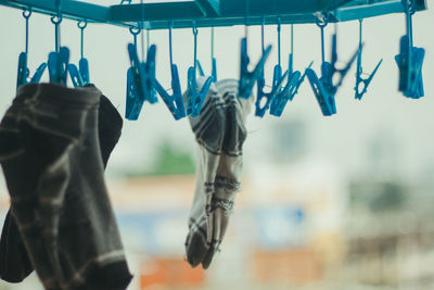 Close-up of clothes hanging on clothesline