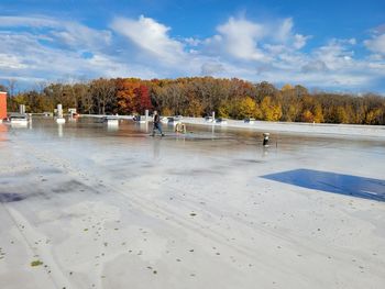 Scenic view of lake against sky during autumn