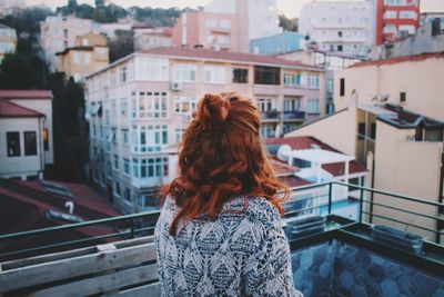 Woman looking at city