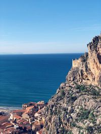 Scenic view of sea against blue sky