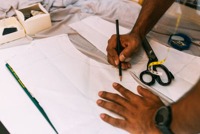 Close-up of human hand drawing