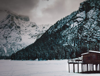 Scenic view of snowcapped mountains against sky during winter