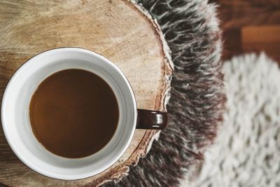 Directly above shot of coffee cup on table