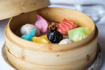 High angle view of candies in bowl on table