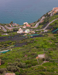 High angle view of town by sea