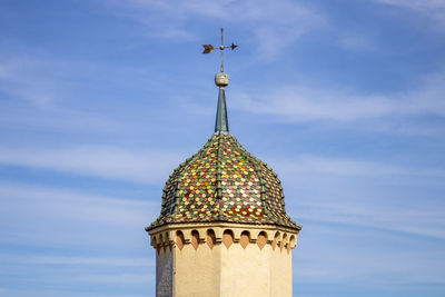 Low angle view of bell tower against sky
