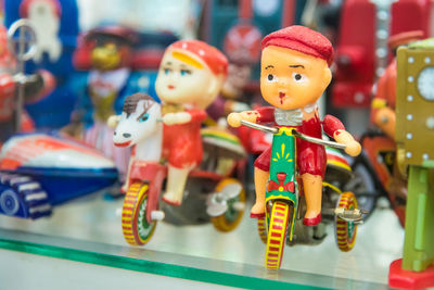 Close-up of toys on shelf in store