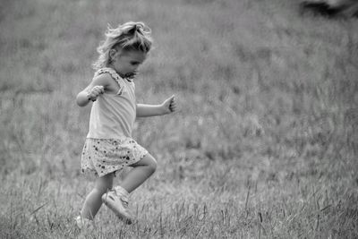 Girl playing on field