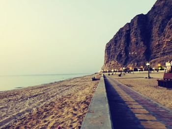 Panoramic view of beach against clear sky