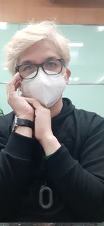 Portrait of young man wearing eyeglasses