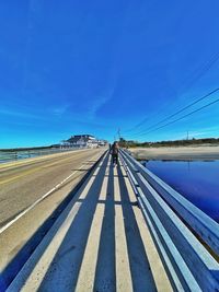 Road against blue sky