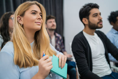 People sitting on chair during meeting