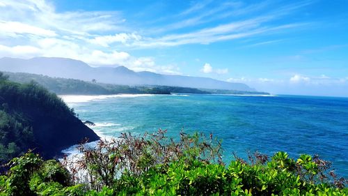 Scenic view of sea against cloudy sky