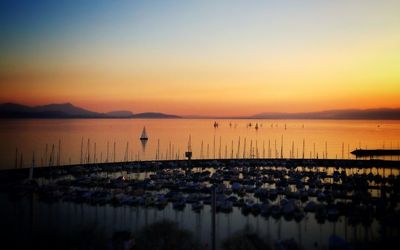 Scenic view of lake at sunset