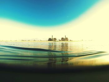 Scenic view of sea at sunset