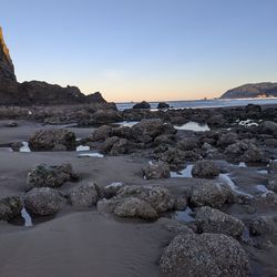 Scenic view of sea against clear sky during sunset