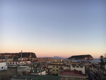 High angle shot of townscape against clear sky