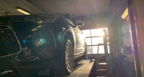 Panoramic view of cars in sunlight