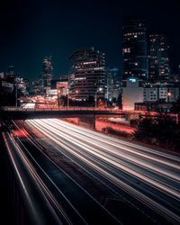 High angle long exposure of light trails on road at night