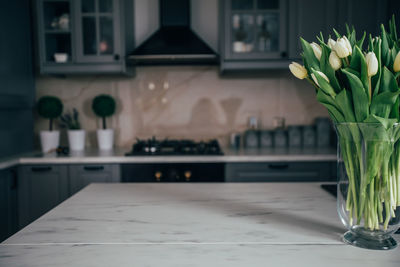 Close-up of vase on table at home