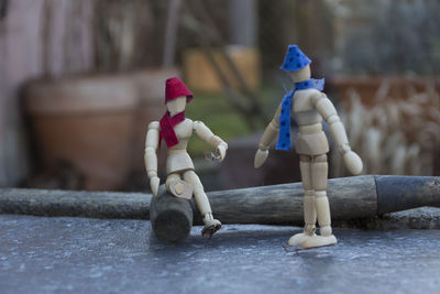 Close-up of wooden figurines on table