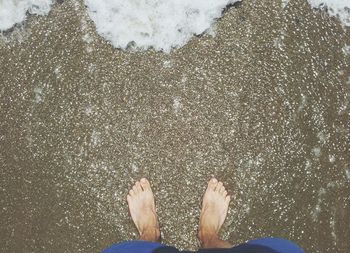 Low section of person in water