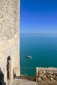 Scenic view of sea against blue sky