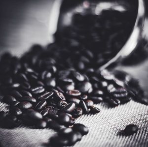 Close-up of coffee beans on table