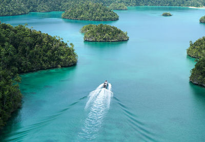 High angle view of sea at raja ampat, indonesia