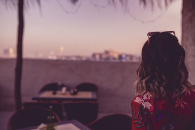 Rear view of woman looking at sea