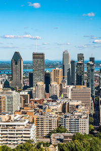Modern buildings in city against sky