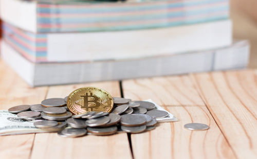 Close-up of coins on table