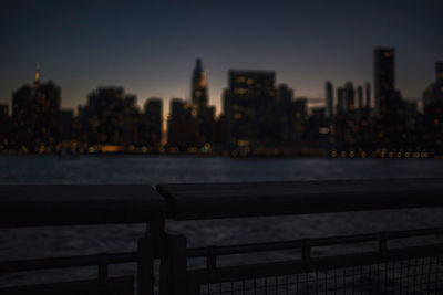 View of city buildings at dusk