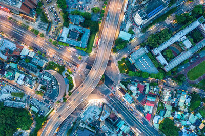 High angle view of city street amidst buildings