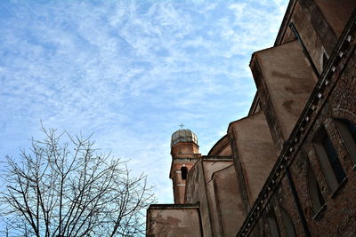 Low angle view of old building against sky