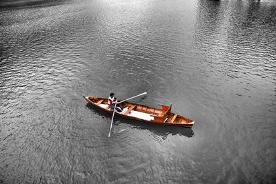 High angle view of people on boat in river