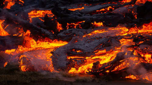 Full frame shot of bonfire with fire crackers at night