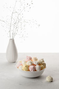 Close-up of food on table against white background