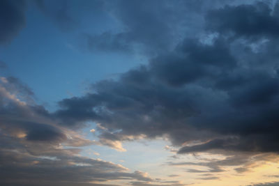 Low angle view of cloudy sky during sunset