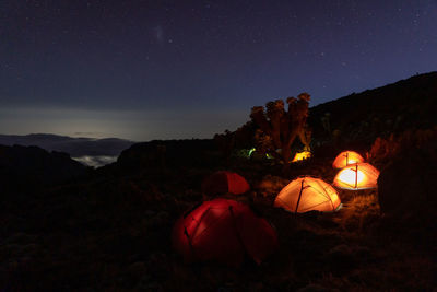 Camp 3 on kilimanjaro with moshi in the background by night