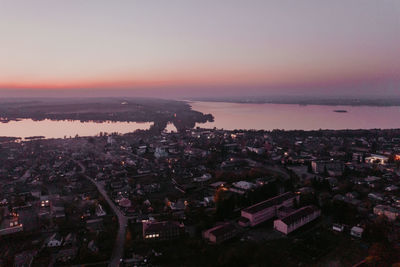 High angle view of townscape against sky during sunset