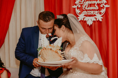 Side view of bride and groom