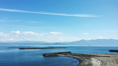 Scenic view of sea against cloudy sky