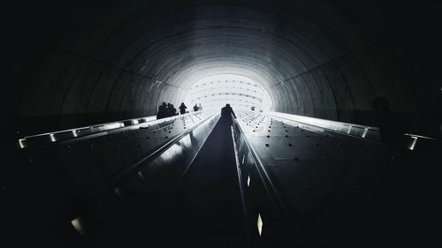 Low angle view of people at subway station