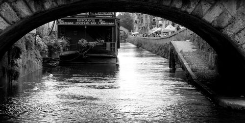 Reflection of footbridge in canal