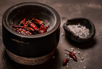 High angle view of red chili pepper on table